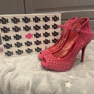 Pink Barbie heels with peep toe and ankle strap